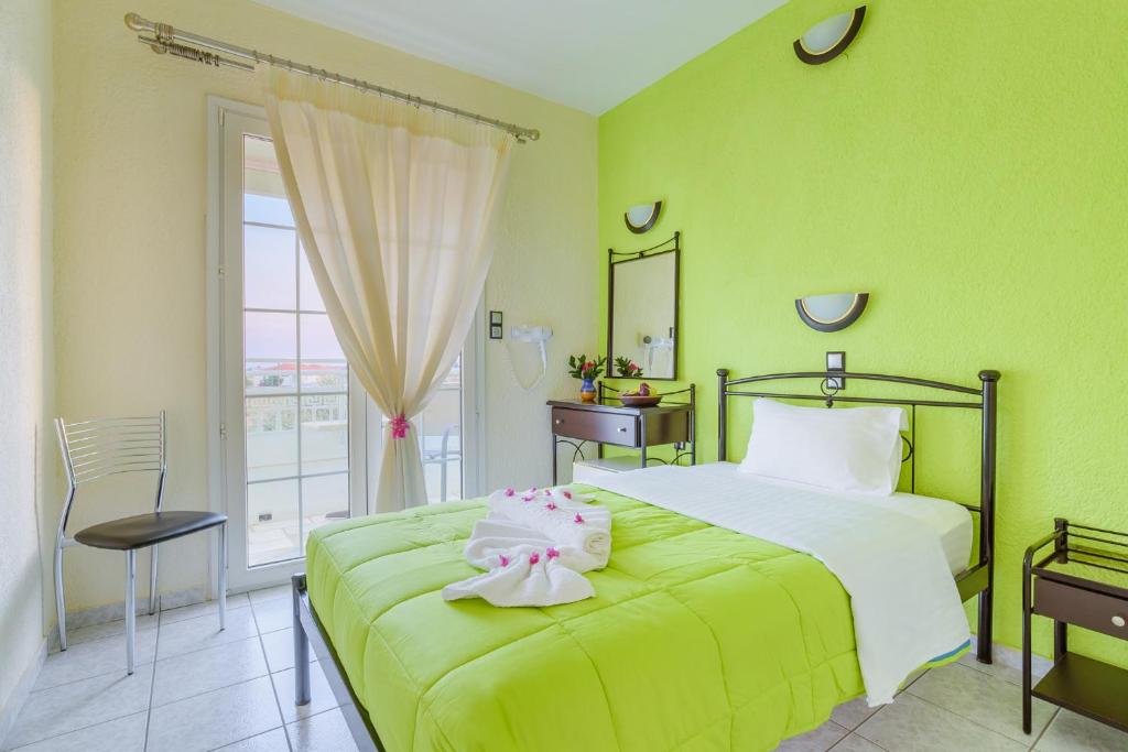 Postel nebo postele na pokoji v ubytování Evelin hotel