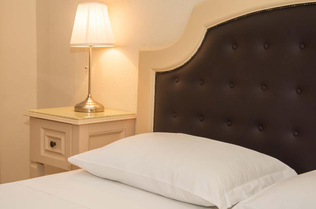 Posteľ alebo postele v izbe v ubytovaní La Collegiata Guest House