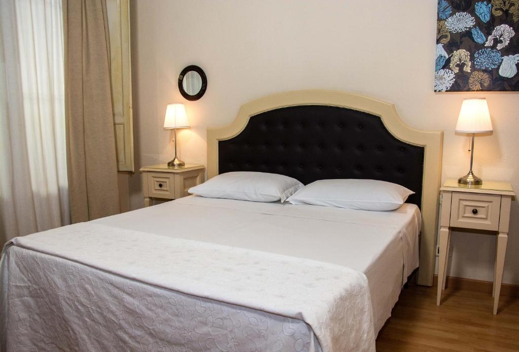Posteľ alebo postele v izbe v ubytovaní La Collegiata Guest House