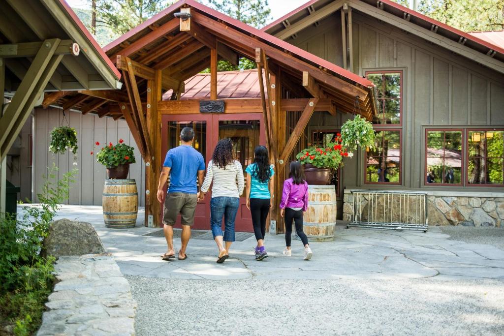 a group of people walking into a building at Sleeping Lady Mountain Resort in Leavenworth