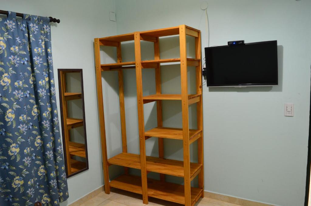 TV a/nebo společenská místnost v ubytování Hotel Yvy Pyta