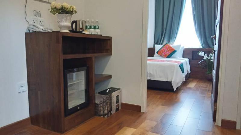 Postel nebo postele na pokoji v ubytování Serapi Hotel