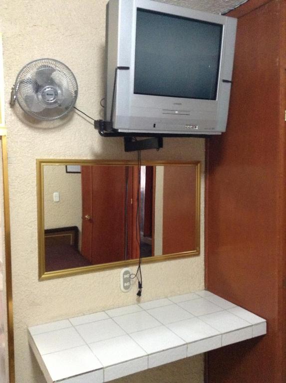 TV a/nebo společenská místnost v ubytování Hotel Palacio