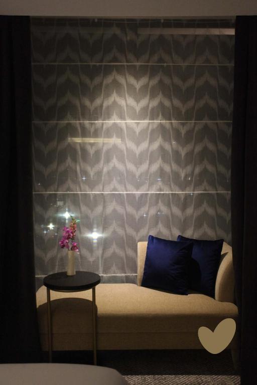Posezení v ubytování Goodrich Suites, Jakarta