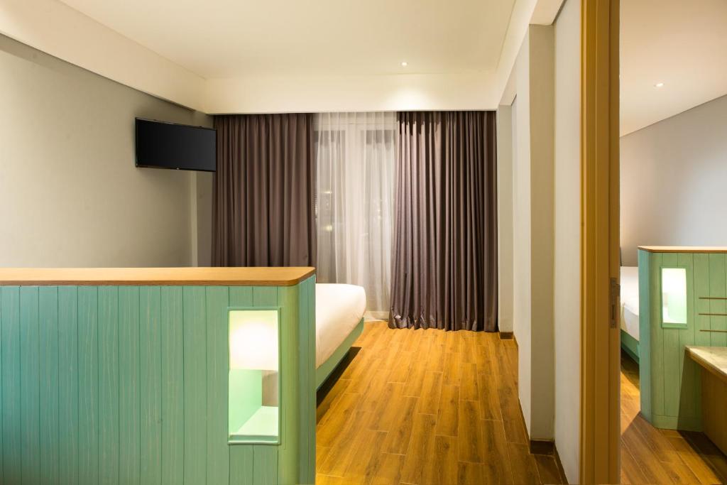 TV a/nebo společenská místnost v ubytování Hotel Santika Premiere Garut