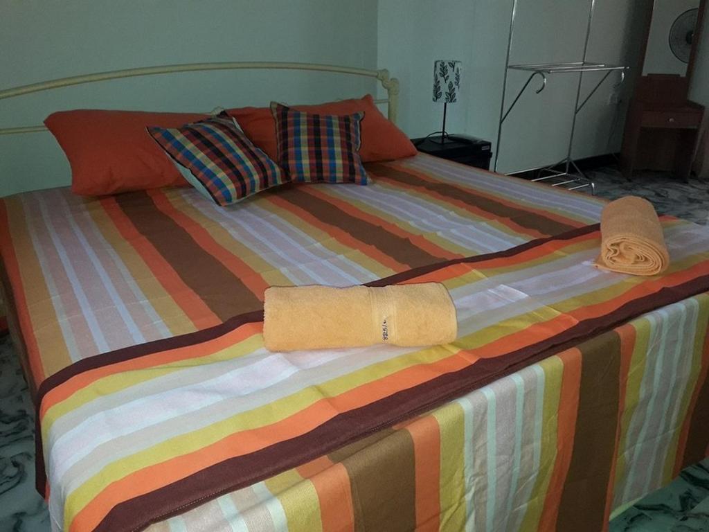 Postel nebo postele na pokoji v ubytování Wattle Inn
