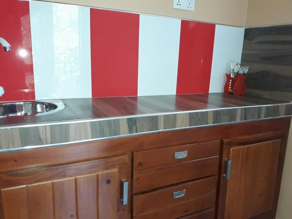 Kuchyň nebo kuchyňský kout v ubytování Wattle Inn
