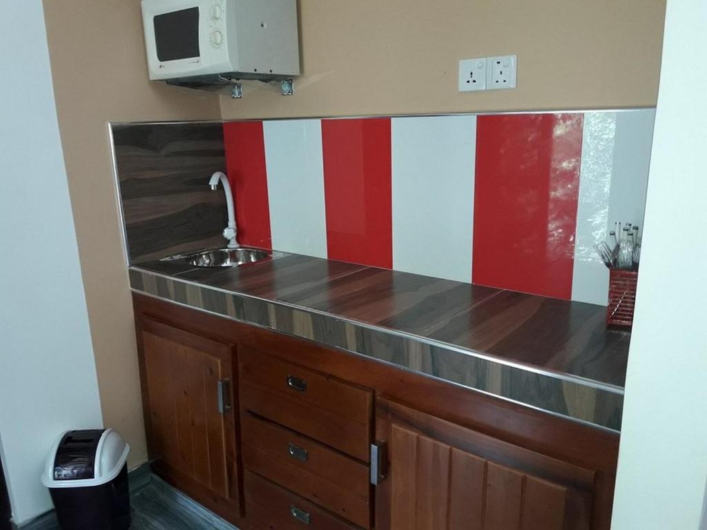 Kuchyň nebo kuchyňský kout v ubytování Wattle Inn