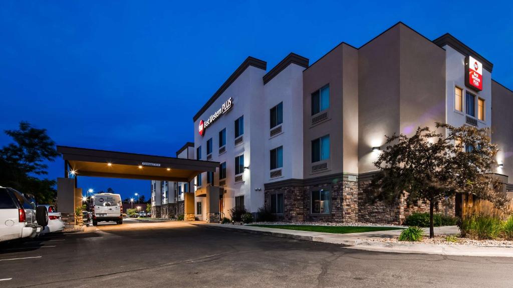 a rendering of a hotel with a parking lot at Best Western Plus Airport Inn & Suites in Salt Lake City