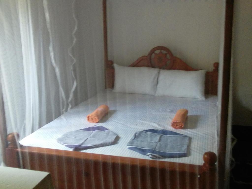 Postel nebo postele na pokoji v ubytování Villa Pipe Dream