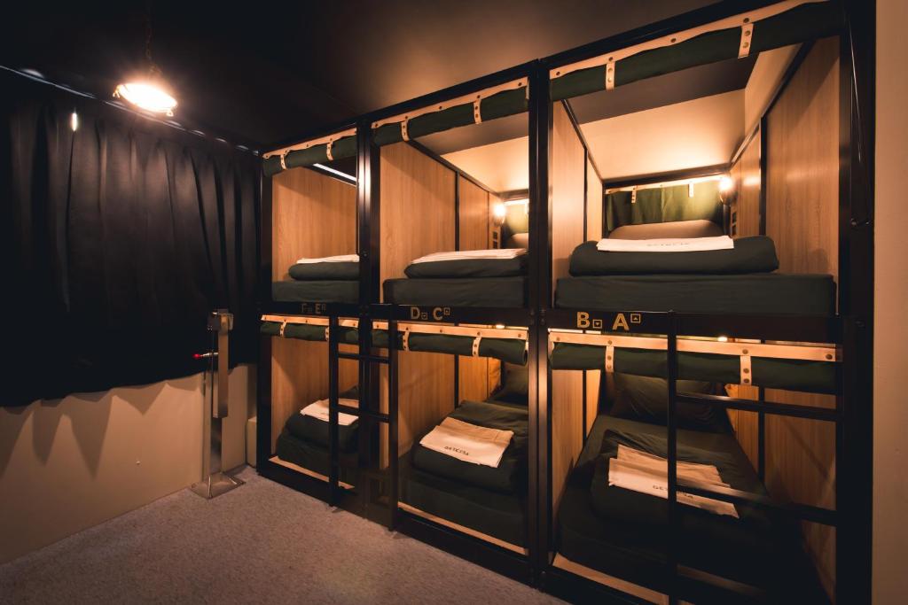 Postel nebo postele na pokoji v ubytování Getcha Hostel