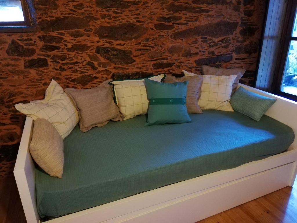 Postel nebo postele na pokoji v ubytování Casinha do Talasnal