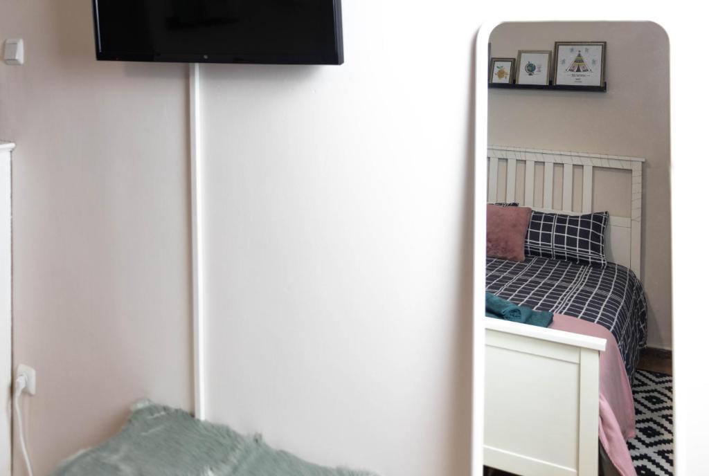 A television and/or entertainment centre at Cozy Studio in the center of Athens
