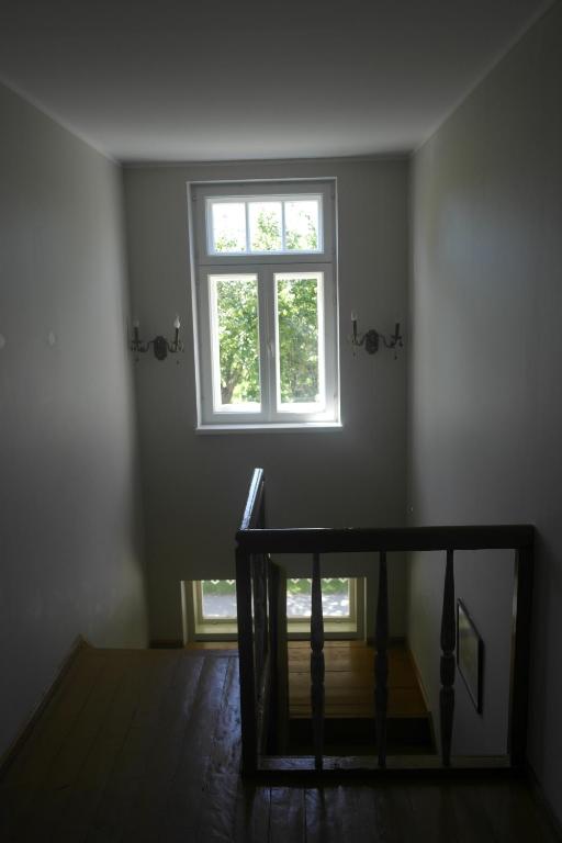 Postel nebo postele na pokoji v ubytování Tulbi Guesthouse