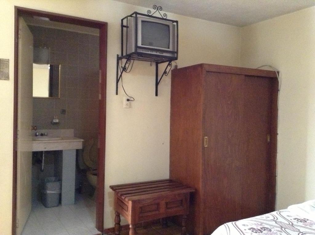 TV a/nebo společenská místnost v ubytování Hotel Atilanos
