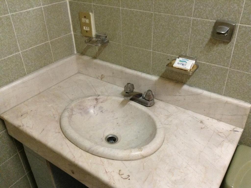 Koupelna v ubytování Hotel Atilanos