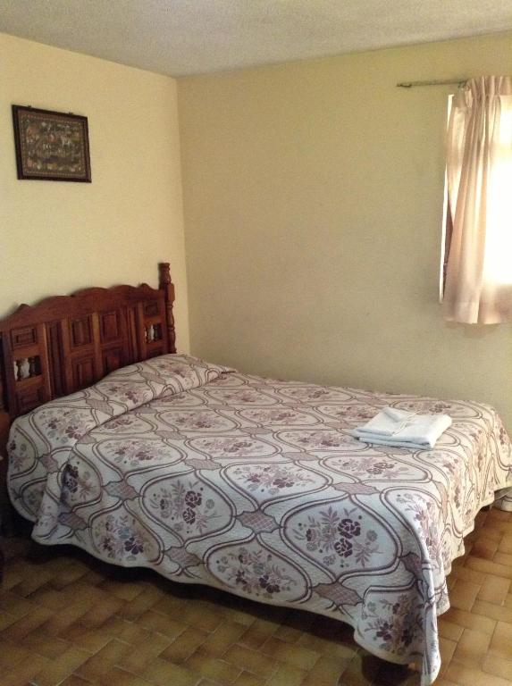 Postel nebo postele na pokoji v ubytování Hotel Atilanos