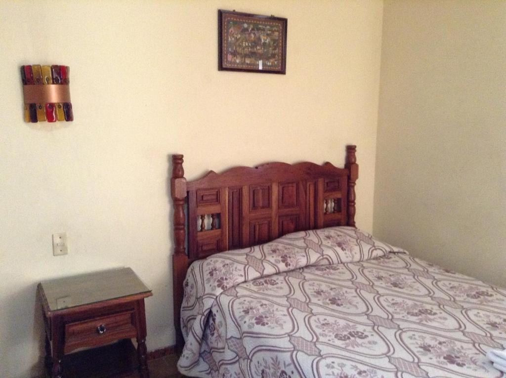 Postel nebo postele na pokoji v ubytování Hotel Atilanos