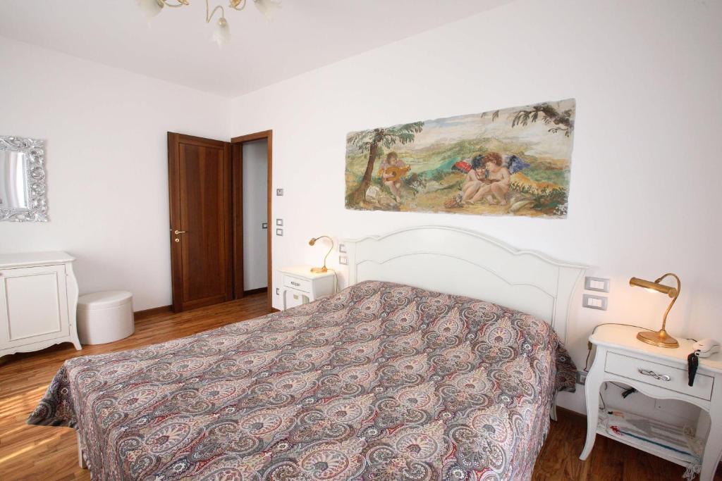 Posteľ alebo postele v izbe v ubytovaní Country House Barone D'Asolo