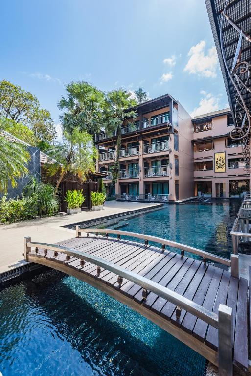 Der Swimmingpool an oder in der Nähe von Princess Kamala Beachfront Hotel - SHA Extra Plus