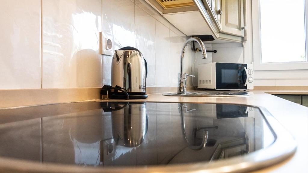 Kuchyň nebo kuchyňský kout v ubytování Apartamento Cadiz Paradiso