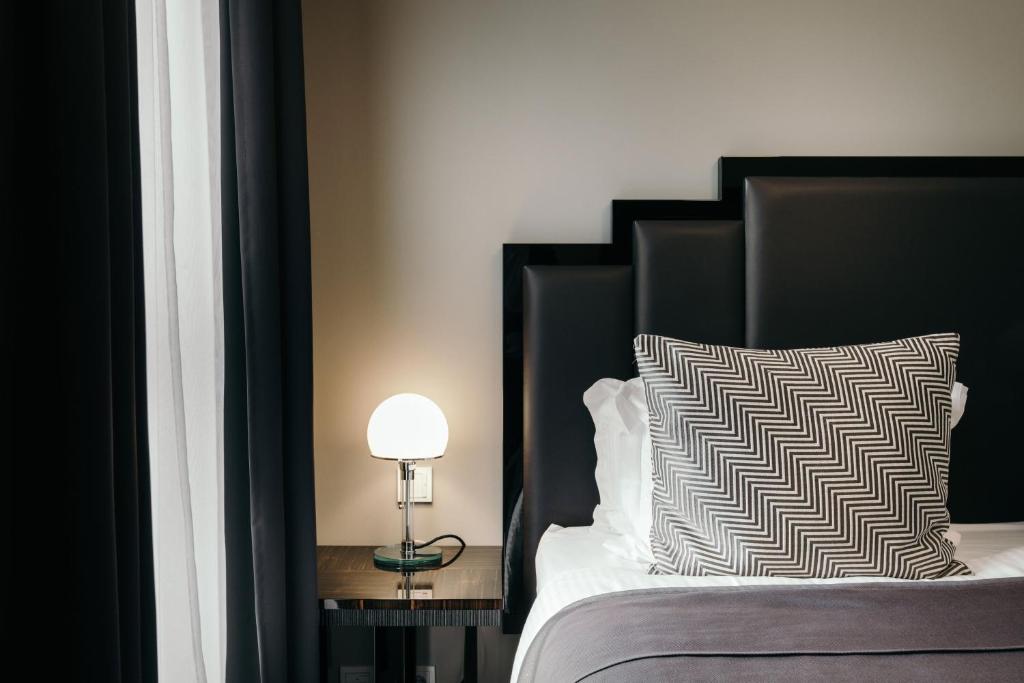 Postel nebo postele na pokoji v ubytování Hotel Borg by Keahotels
