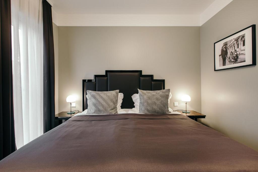 Postel nebo postele na pokoji v ubytování Hotel Borg by Keahotels