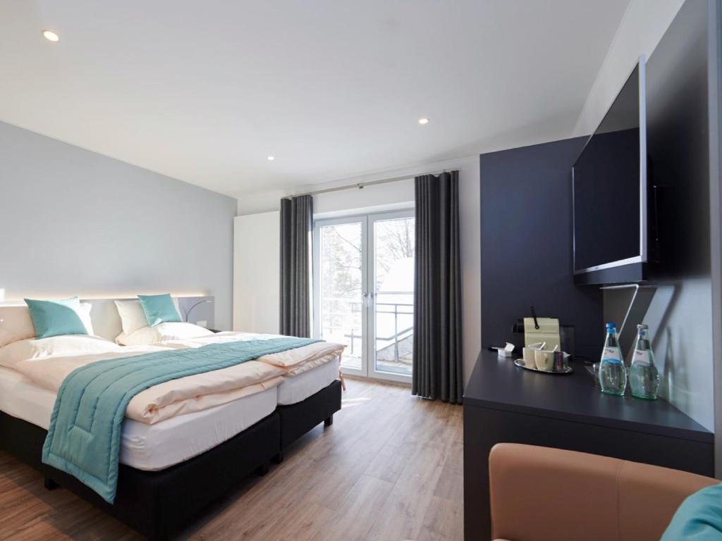 Postel nebo postele na pokoji v ubytování Amel Mitte Bed & Breakfast