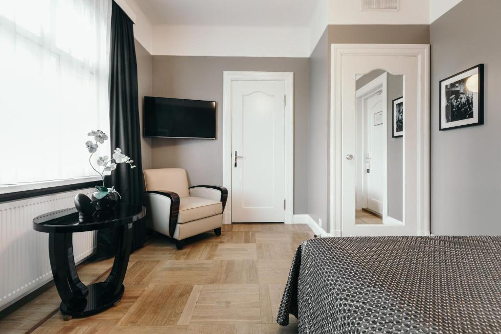TV a/nebo společenská místnost v ubytování Hotel Borg by Keahotels