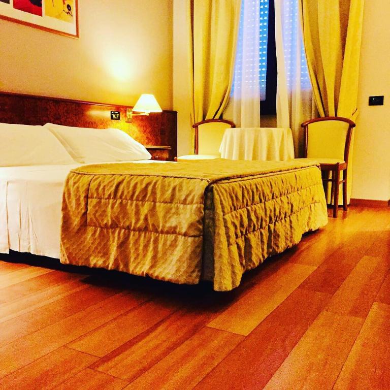 Posteľ alebo postele v izbe v ubytovaní Hotel Motel Europa
