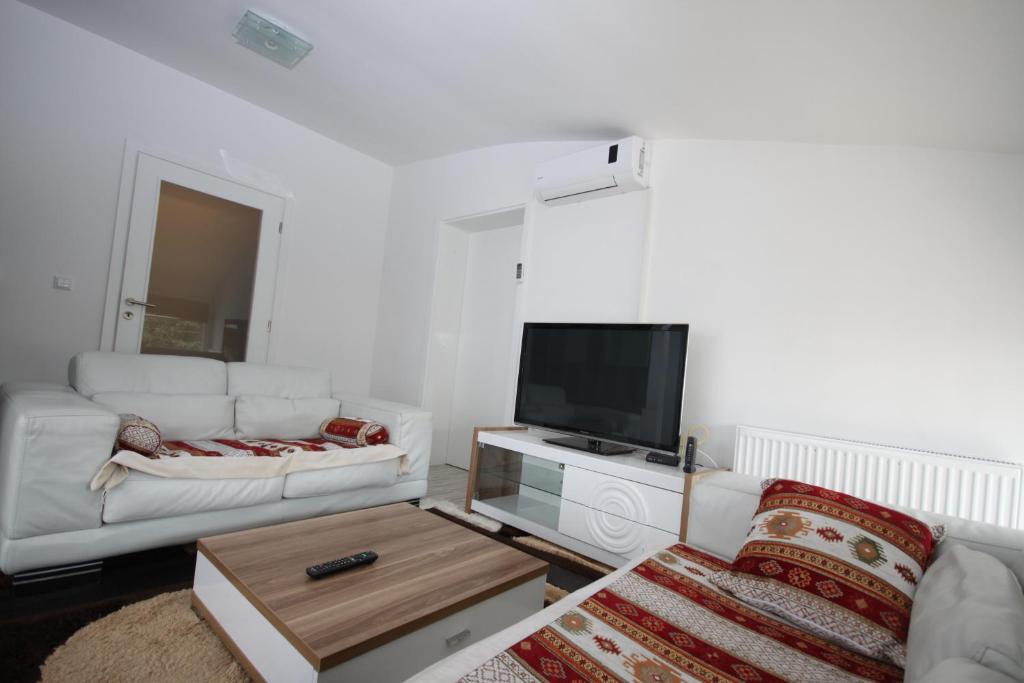 Postel nebo postele na pokoji v ubytování Sarajevo Apartments