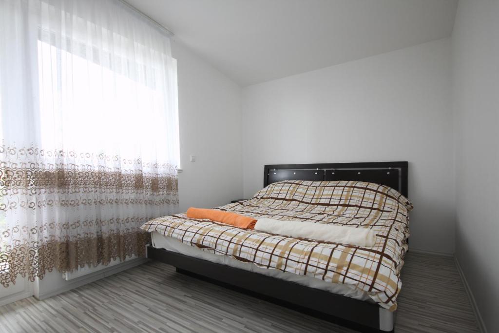 Postel nebo postele na pokoji v ubytování Sarajevo Apartments