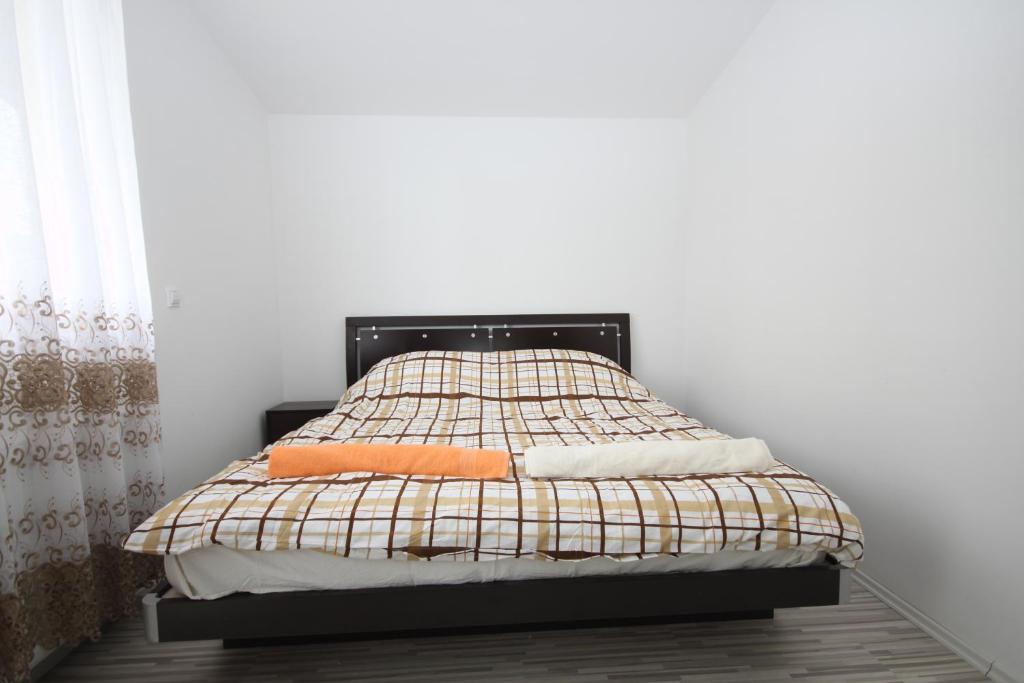 Postel nebo postele na pokoji v ubytování Sarajevo Apartments