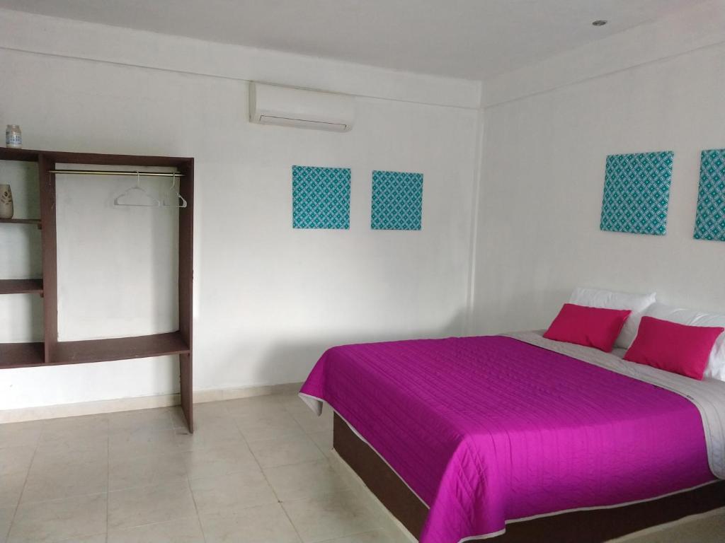 Postel nebo postele na pokoji v ubytování Hotel España
