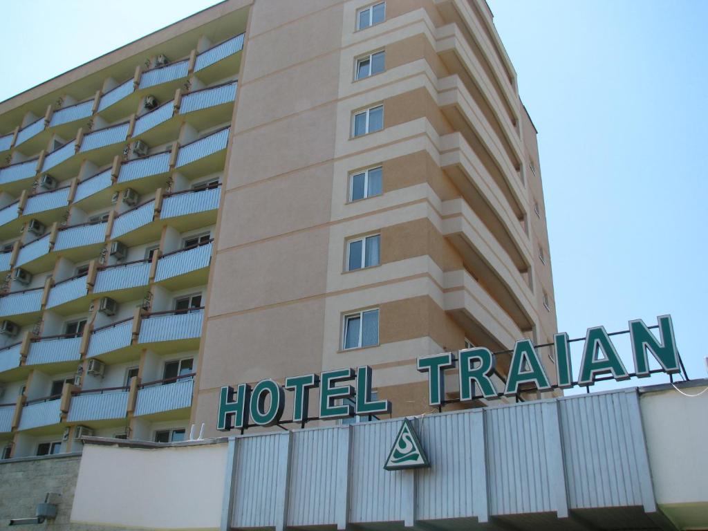 a hotel translation sign in front of a building at Hotel Traian Eforie Nord in Eforie Nord