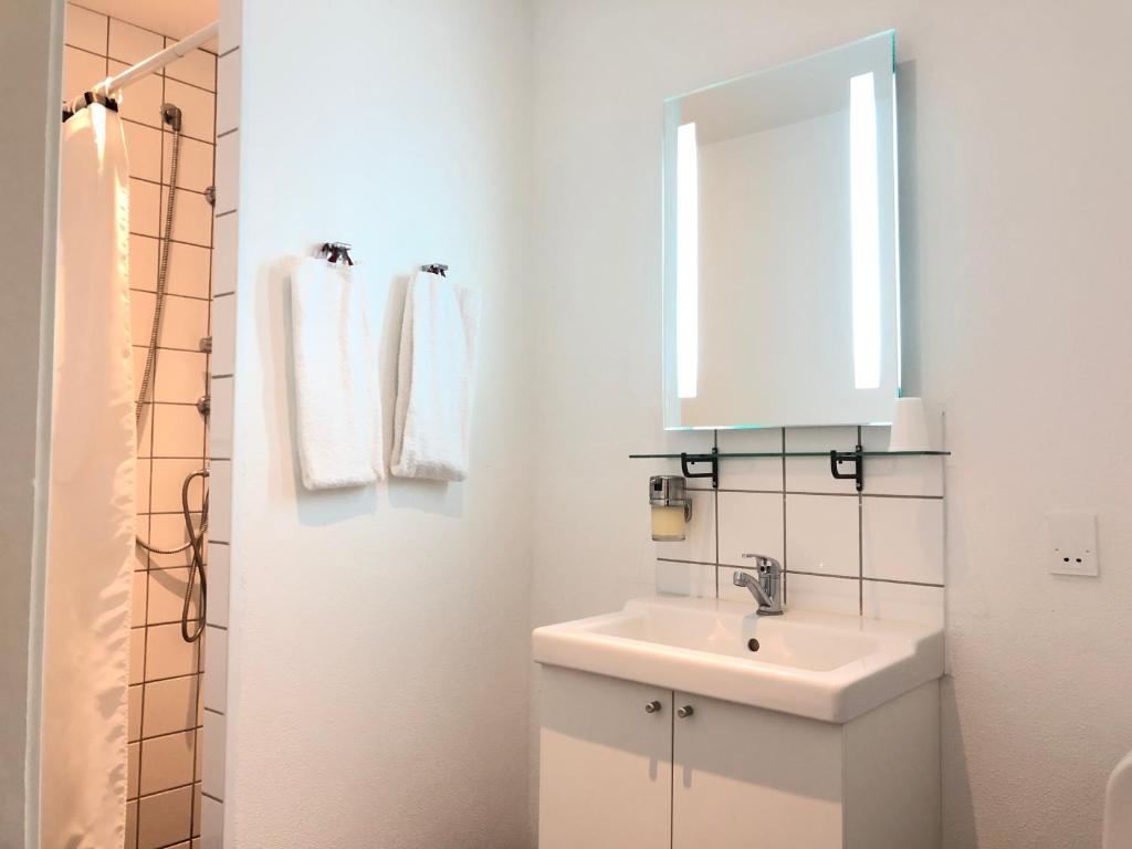 Koupelna v ubytování Hotel Aulum Kro