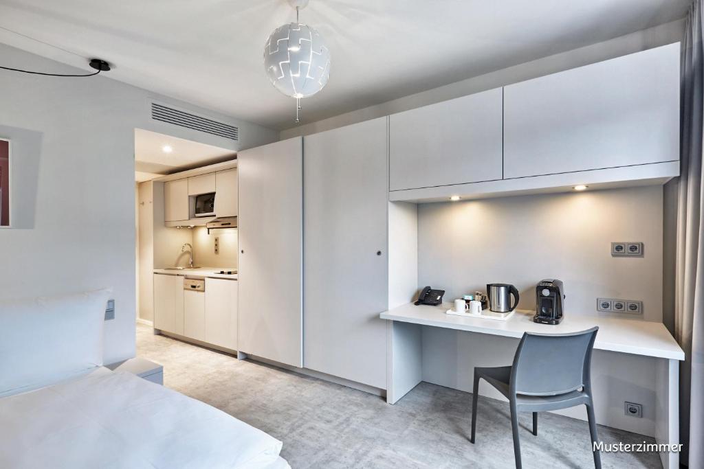 H.ome Serviced Apartments München - Resim 15