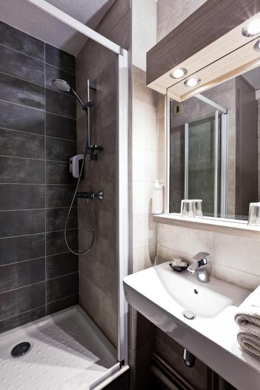 Koupelna v ubytování Hotel Le Lumière