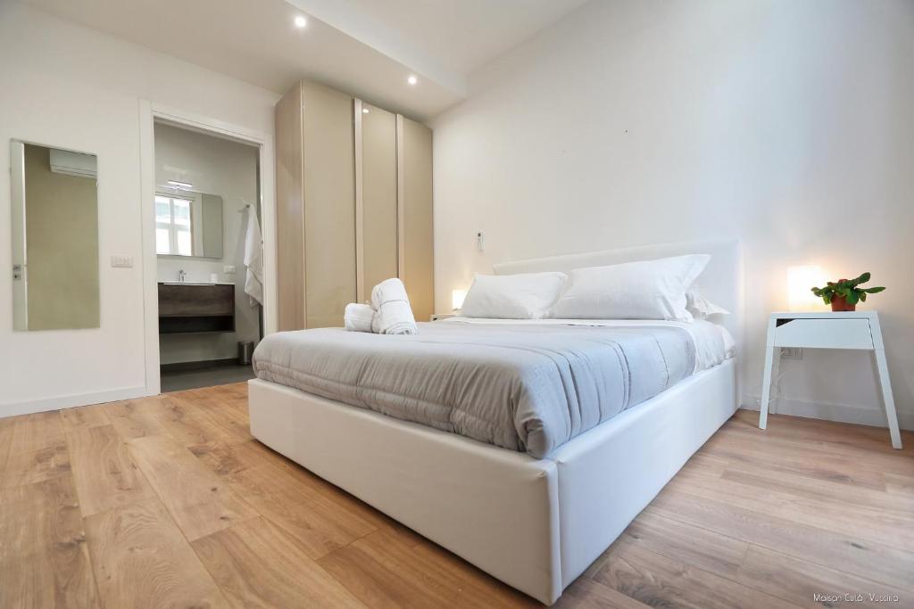Posteľ alebo postele v izbe v ubytovaní Maison Cutò