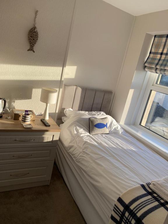Postel nebo postele na pokoji v ubytování Sunrise Guest House