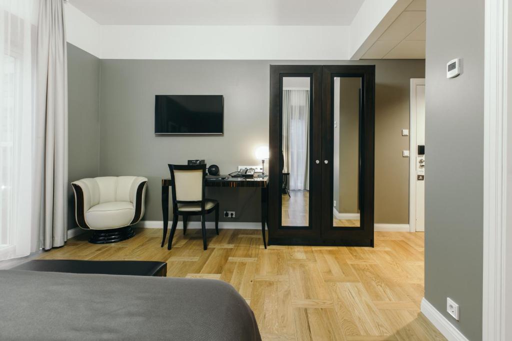 TV a/nebo společenská místnost v ubytování Hotel Borg by Keahotels
