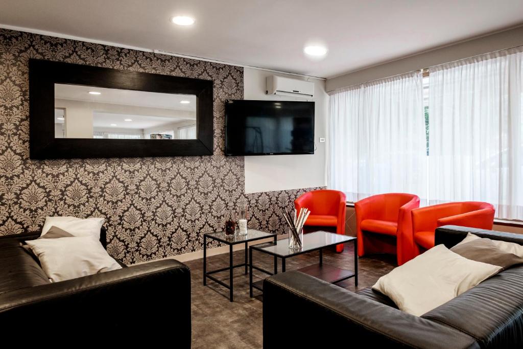 Telewizja i/lub zestaw kina domowego w obiekcie HOTEL CONDOR