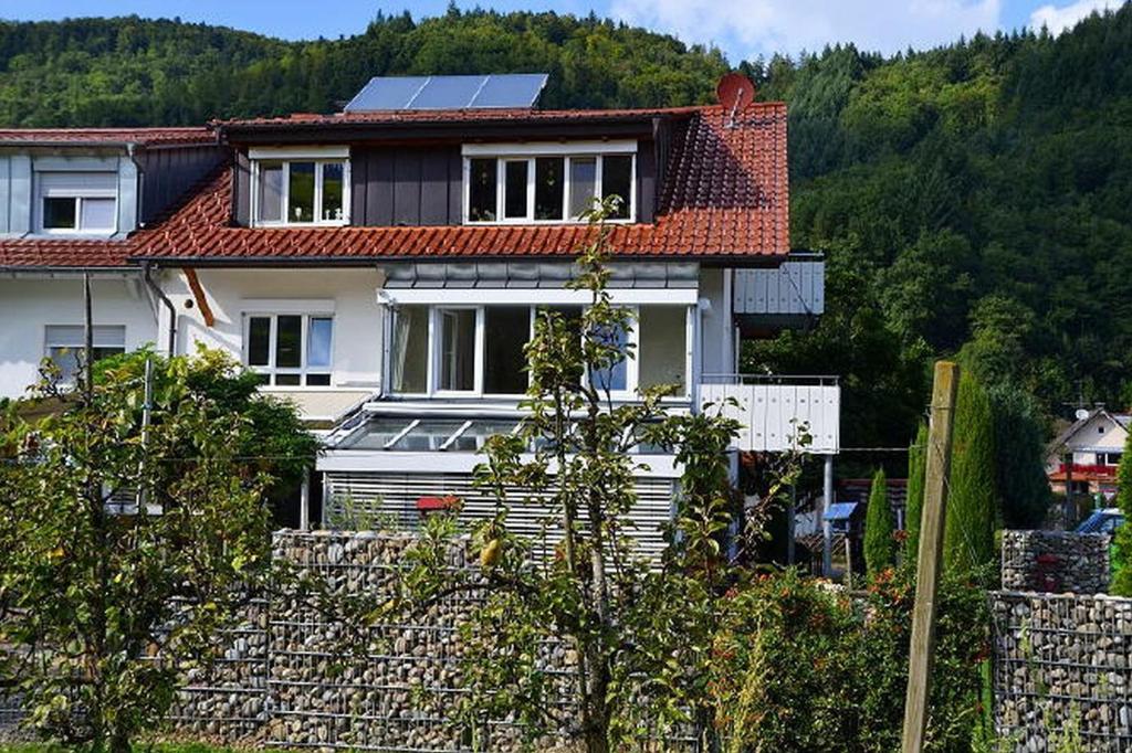 a house with solar panels on top of it at Haus Reichenbach in Glottertal