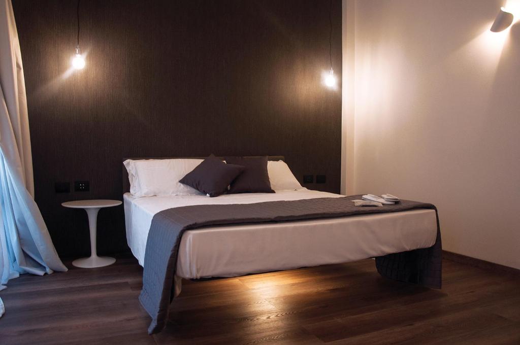 Postel nebo postele na pokoji v ubytování HOMY BnB