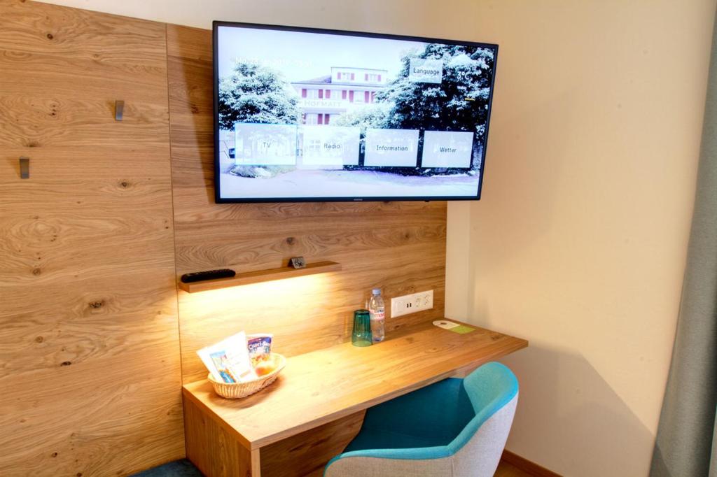 TV a/nebo společenská místnost v ubytování Hotel & Restaurant Hofmatt