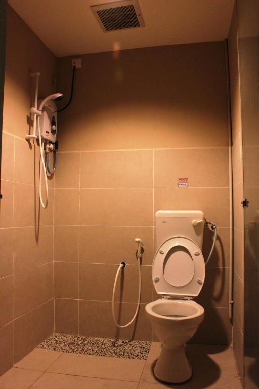 Koupelna v ubytování T Hotel