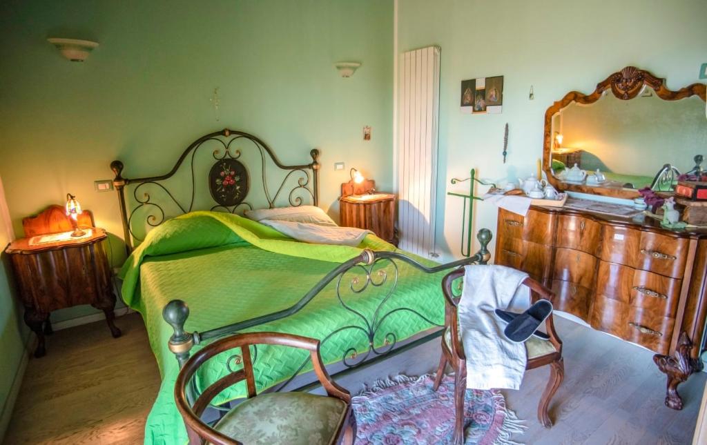Łóżko lub łóżka w pokoju w obiekcie Villa Farfalla Bianca