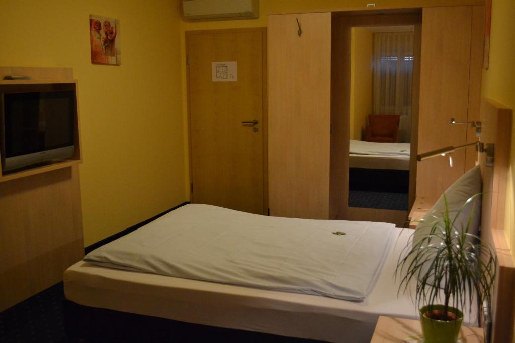 Postel nebo postele na pokoji v ubytování Landgasthof Hock