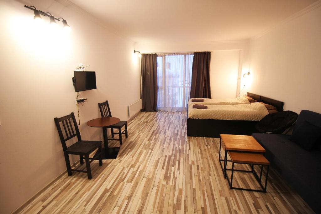 TV a/nebo společenská místnost v ubytování Apartment N506 Gudauri Loft