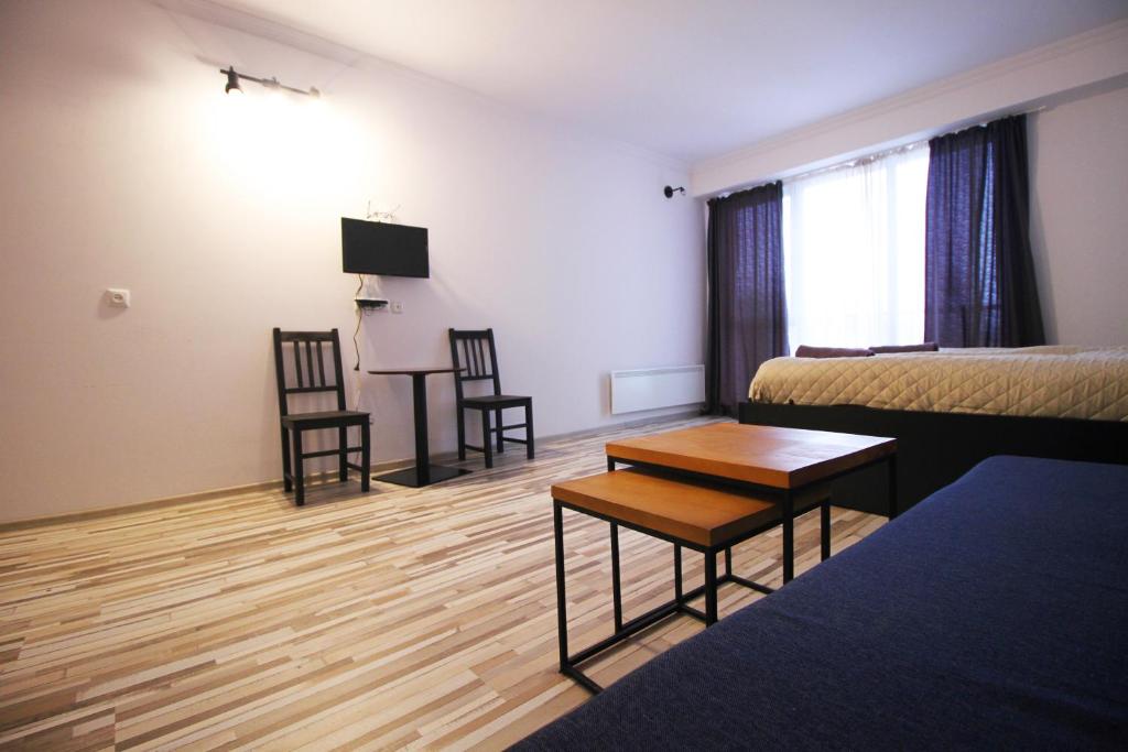 Postel nebo postele na pokoji v ubytování Apartment N506 Gudauri Loft